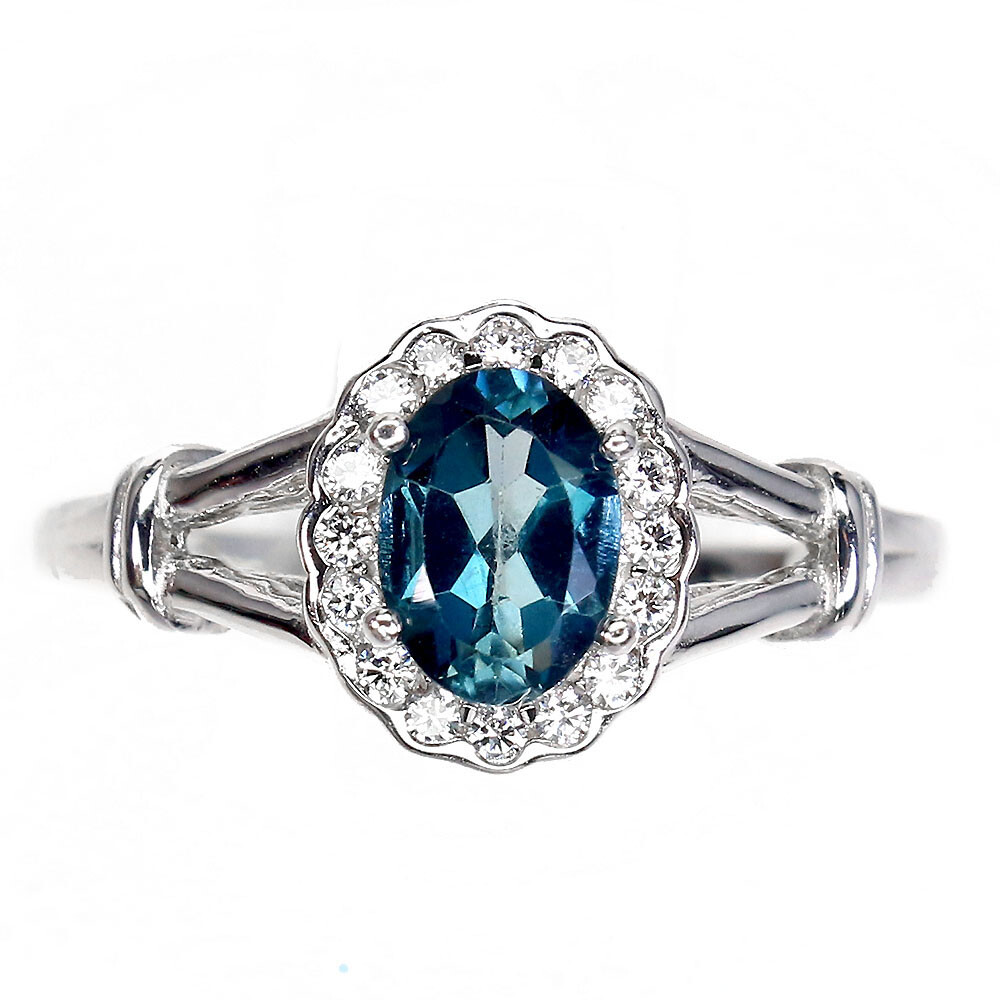 Anello Dorato Dei Gioielli Con Topazio Blu Fotografia Stock - Immagine - Foto 9