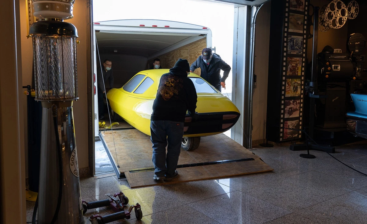 Staff of Nebraska's Speedway Motors Museum move The Dale from moving the Dale from storage to a prominent display.