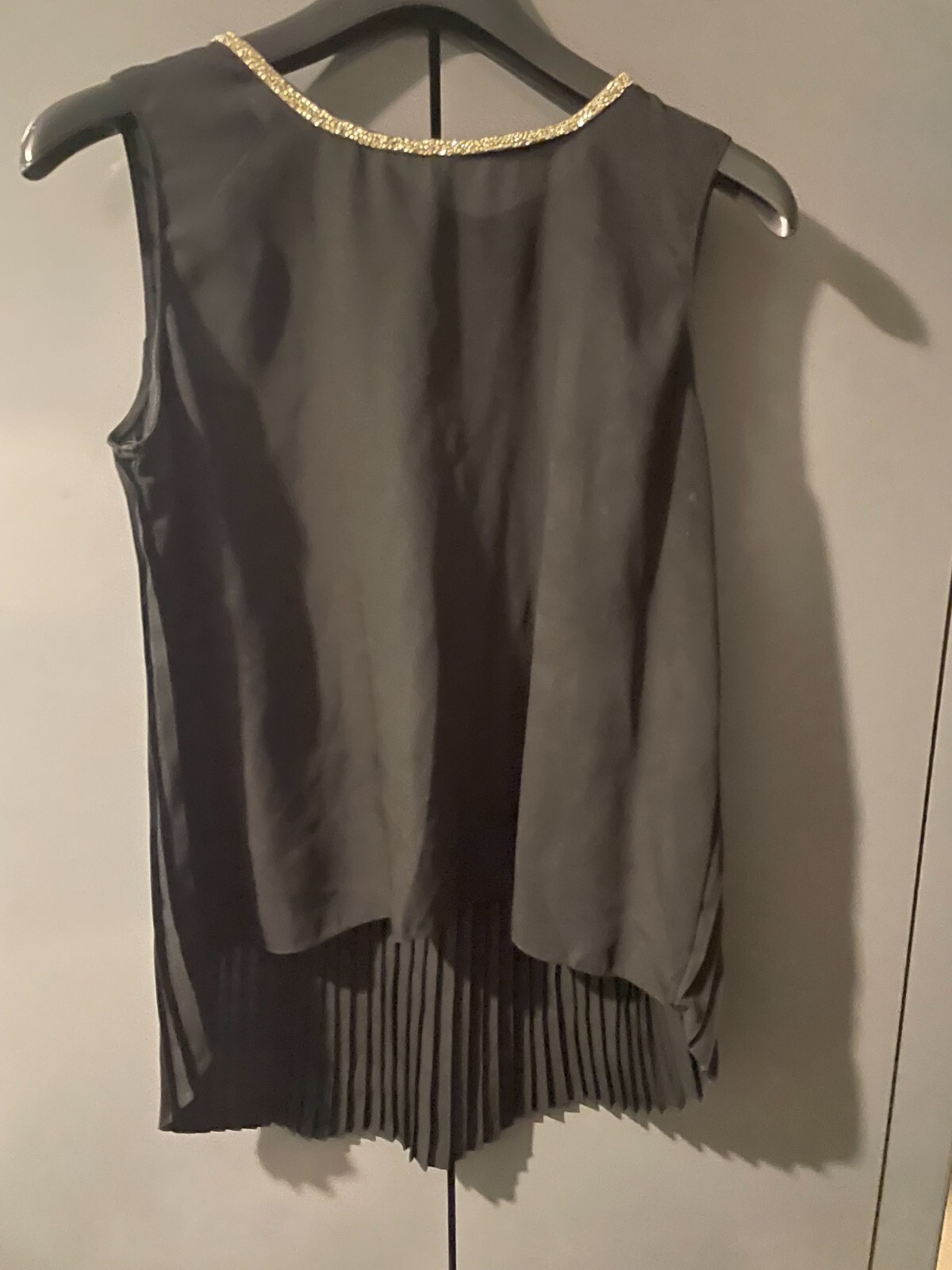 Black sleeveless pleated back blouse size 12 for women