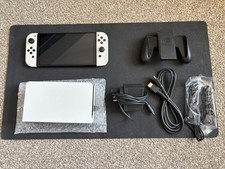 Nintendo Switch OLED Model HEG-001 Handheld Console 64GB Black/White