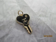 CHANEL CHARM ZIP PULL GOLD TONE , BLACK, 22X27MM KEY HEART