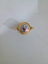 miniature brass compass