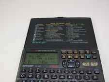 Vintage Sharp YO-160 Black Portable 64kb Electronic Personal Organizer PDA