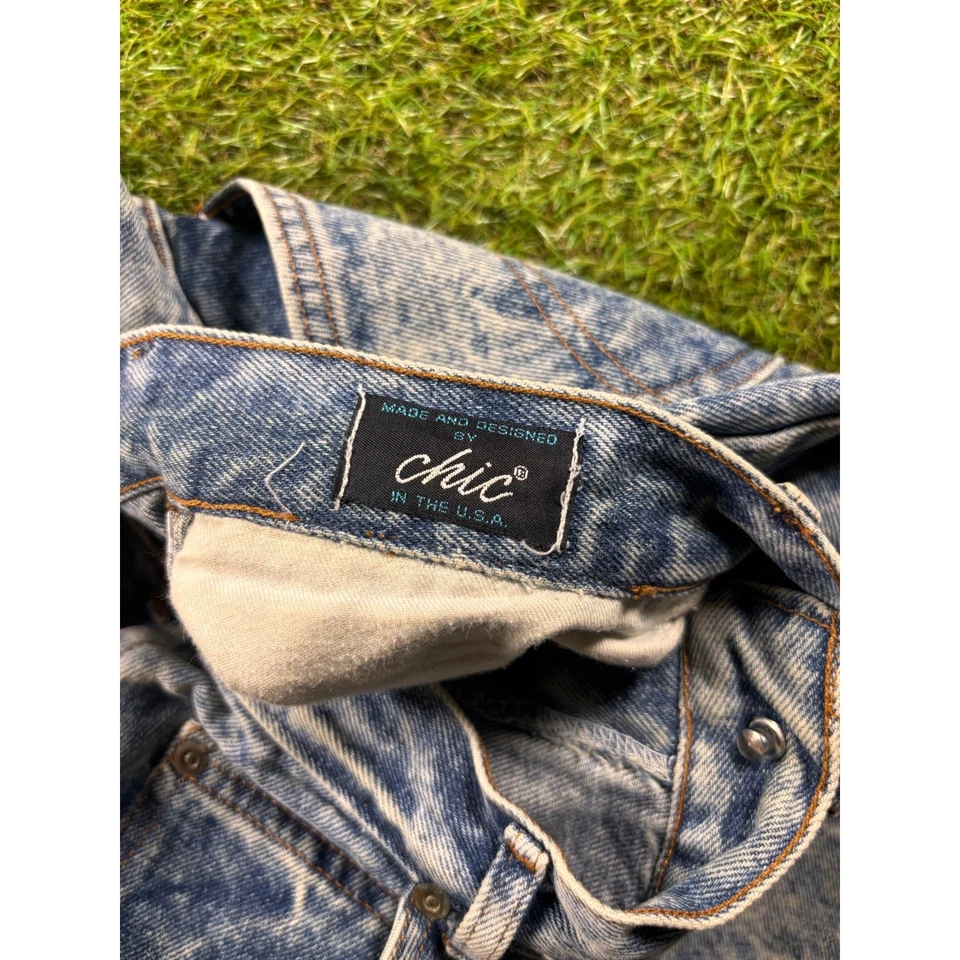 Pantalones de mezclilla para mamá de cintura alta lavados con ácido elegantes de colección Foto 2 de 4