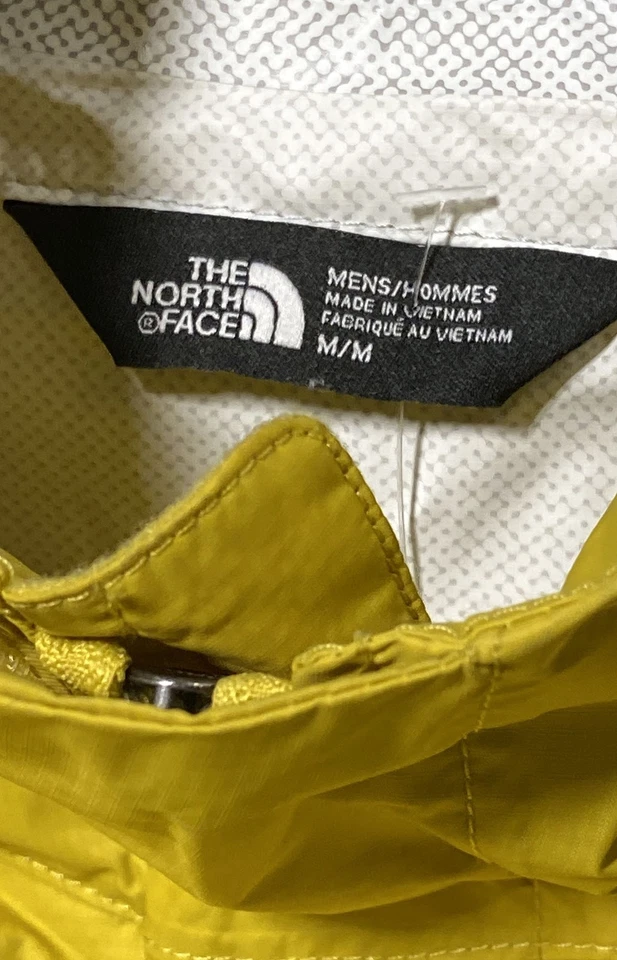 Chaqueta de lluvia cortavientos ligera amarilla para hombre The North Face talla M Foto 4 de 4