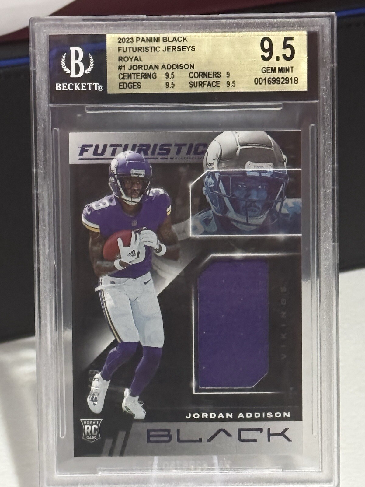 2023 Panini Black Futuristic Jerseys Royal Jordan Addison 