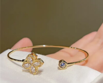 Drehbare offene Armbänder Zirkon vier Blatt Gold für Frauen