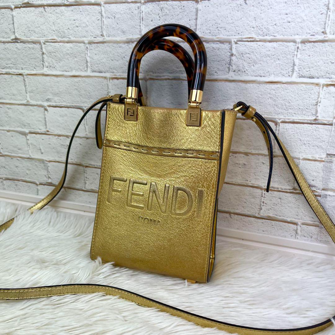 FENDI ゴールド ストライプ ショルダーバッグ FENDI ROMA Sunshine Shopper Mini Hand Shoulder Bag Gold Leather