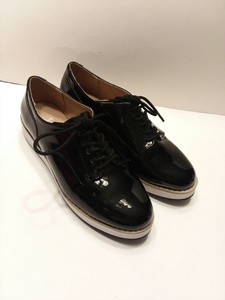 tenis preto brilhante