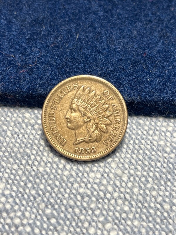 (#101182) Indian Head Cent: 1859.  XF obverse detail. Obliterated reverse