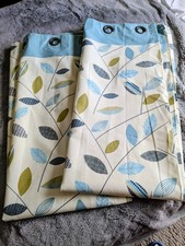 Pair of Lined Curtains with Eyelet Rings. 66 inch Width x 72 Inch Length.