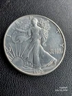 1990 "AMERICAN EAGLE" ONE DOLLAR ONE OUNCE FINE SILVER COIN