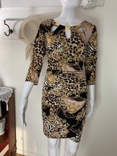 Stretchy￼ Curvy￼ Animal Print 3/4 sleeve dress gold accents On Collar Above knee