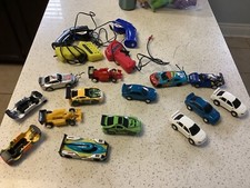 slot cars - racing cars not vintage sold as lot yellow missing car missing head