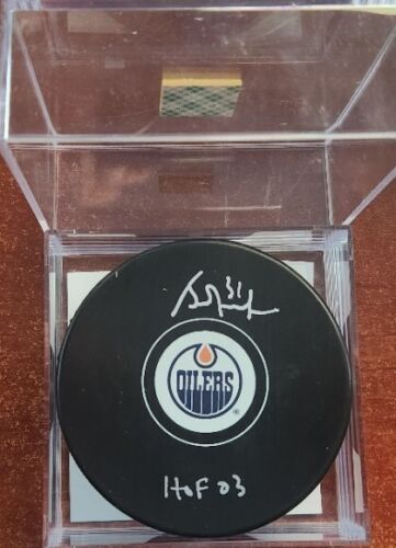 Grant Fuhr autographed Edmonton Oilers puck with HOF 03 inscription - Picture 1 of 2