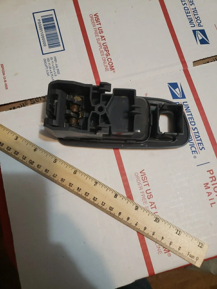 Nissan Xterra 2004 conjunto de cerradura de puerta derecha con bisel Foto 2 de 4