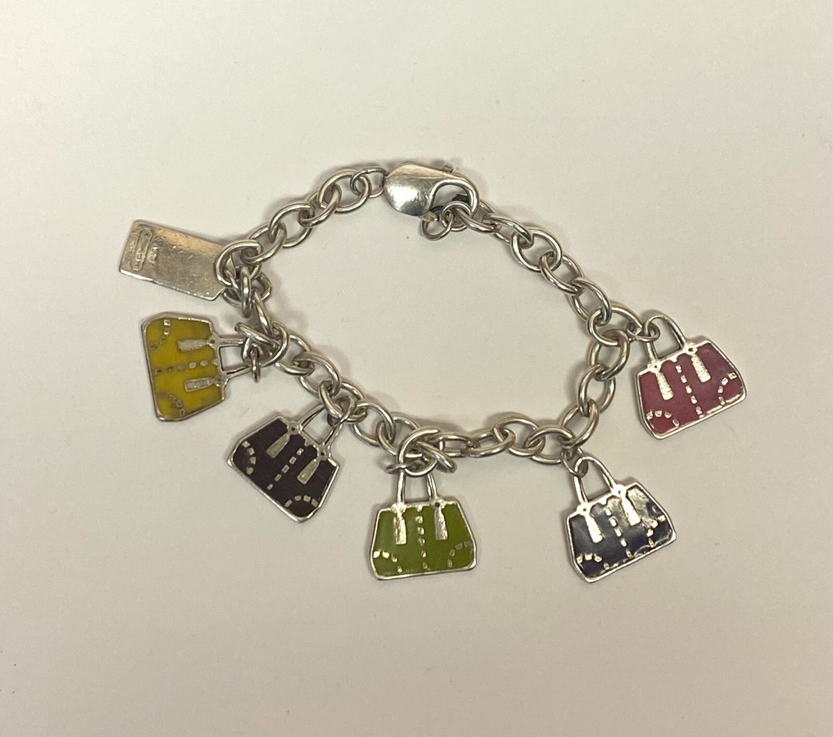 Coach EST. 1941 Sterling Silver Retired Purse Charm Bracelet | eBay
