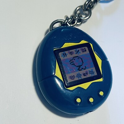 Vintage 1990s Tamagotchi Blue Keychain Bandai McDonalds 1997 Happy