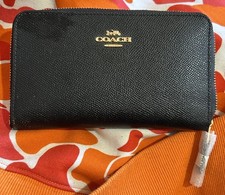 Coach Black Zip-Around Wallet with Credit Card Slots and ID Window