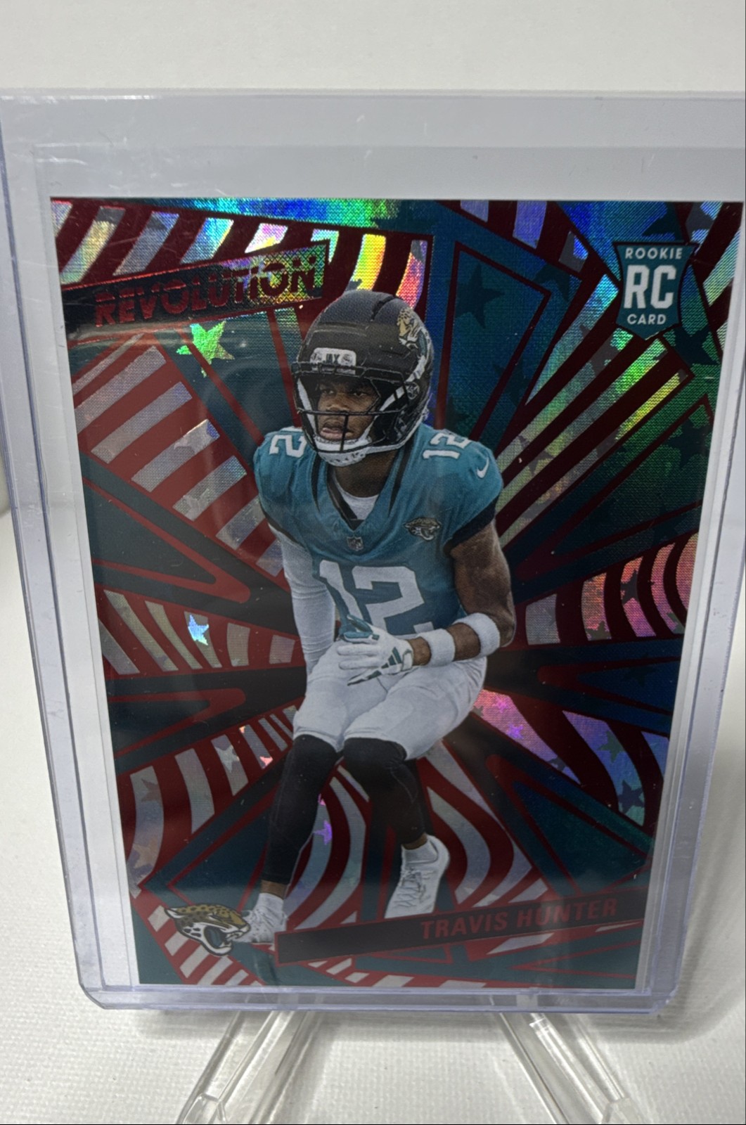 2025 Panini Revolution - Rookies Travis Hunter #242 Red Cosmo (RC)