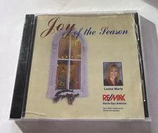 Joy Of The Season Leslee Martz North-San Antonio RE/MAX Cd Small Crack In Case.