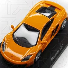 MCLAREN MP4 12C 2011 KYOSHO MINICAR LOTTERY 1 1:64 ORANGE pre 650s NEW IN BOX