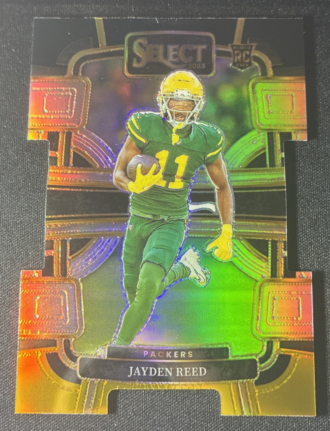 2023 Panini Select - Concourse Jayden Reed #38 Black & Gold Prizm Die-Cut (RC)