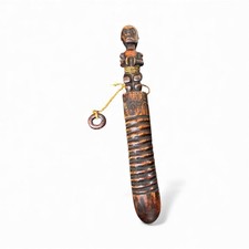 Vintage Guiro, which is an African Musical Percussion Instrument.