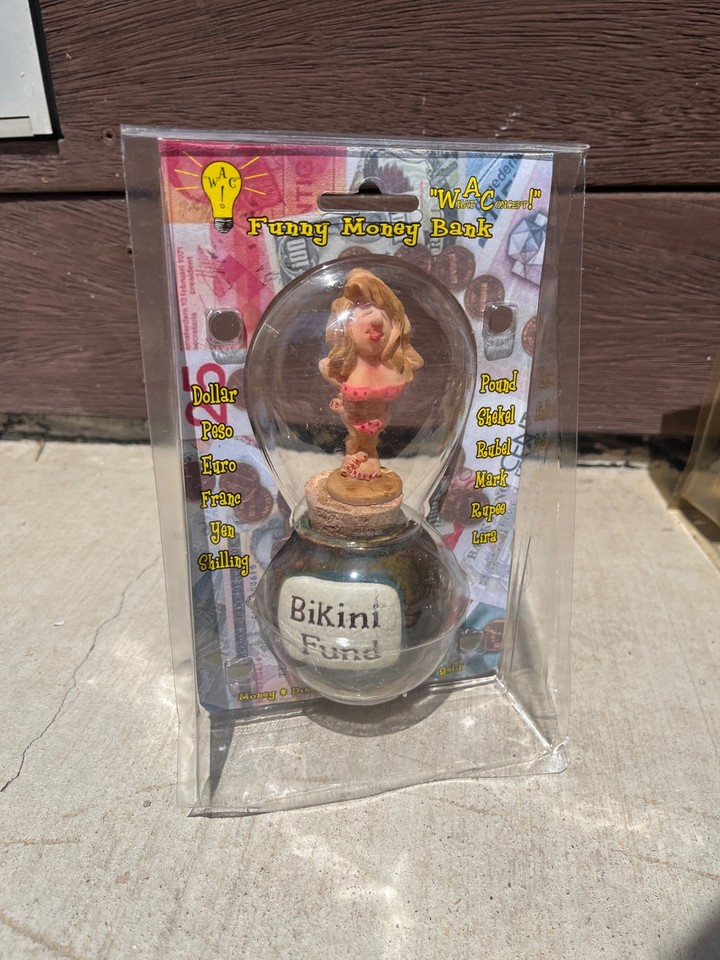 A NOS set of 4 hourglass-shaped novelty money banks that are as much mid-century sculpture as they are a gag — still in original packaging.