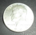 One 1964 Kennedy Half Dollar 90% Silver.  Great Luster.