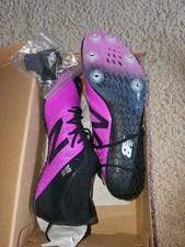 Brand New in box Women's New Balance Purple/Black Sprint Spike Sz. 9.5 w/spikes