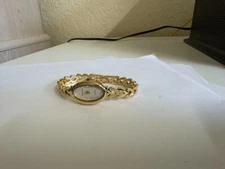 NOS Ladies  Dufonte by   Lucien Piccard  Oval Yellow gold tone watch