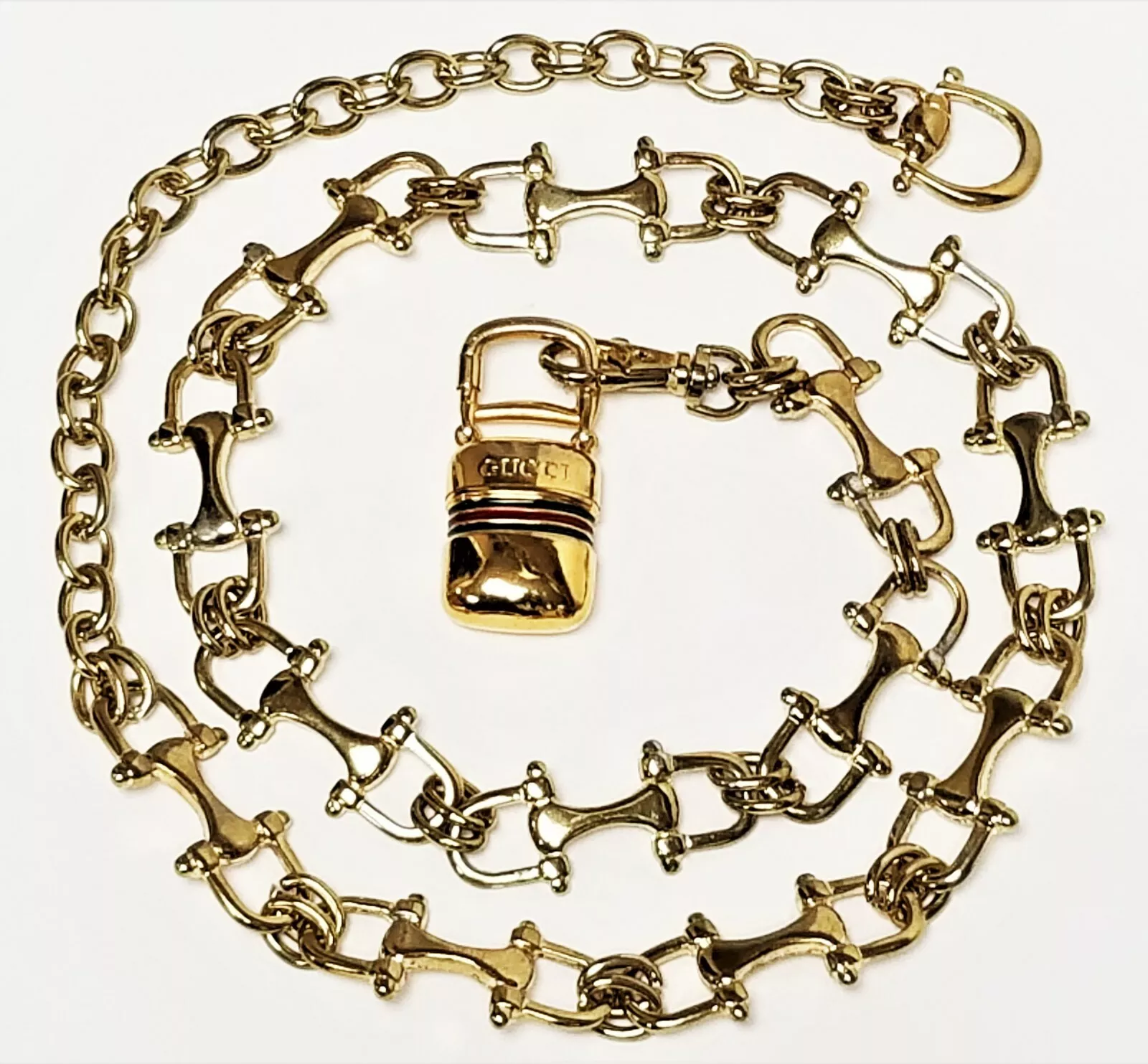 Breloque vintage années 70 GUCCI bride bit plaqué or réglable boîte cachée