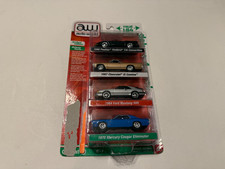 AUTO WORLD 1/64 DELUXE 4-PACK TARGET EXCLUSIVE PONTIAC CHEVY FORD  MERCURY NEW