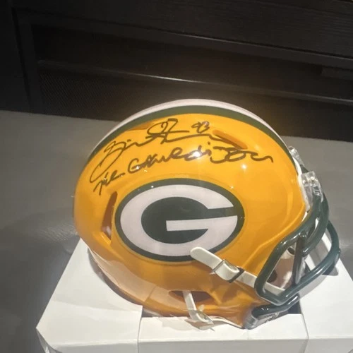 Gilbert Brown signed Riddell mini helmet inscribed with the gravedigger.