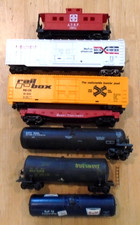 SEVEN MIXED HO SCALE FREIGHT CARS - FOR PARTS OR REPAIR - LOT LL