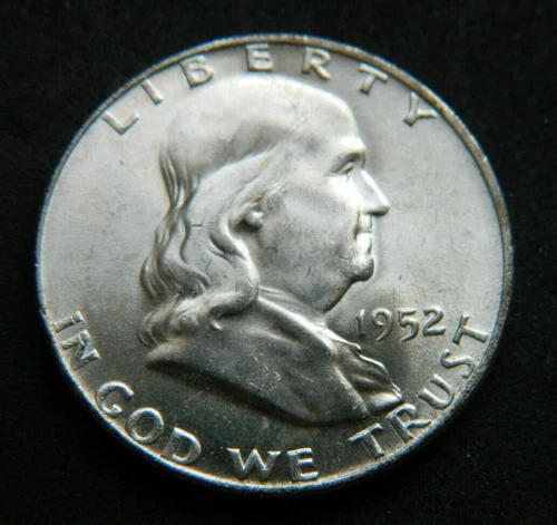 1952-D BU.50C Ben Franklin Half Dollar Coin LIBERTY BELL REV. Naturally toned.