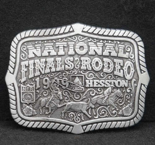 WC03115 GREAT VINTAGE ***1999 NATIONAL FINALS RODEO*** COMMEMORATIVE BELT BUCKLE - Picture 1 of 2