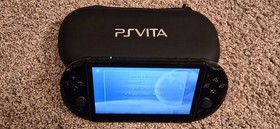 Sony PS Vita Slim PCH-2001 Touchscreen Console w/ Case, Charger & Uncharted Game