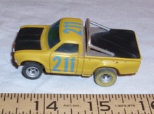 AURORA AFX 211 DATSUN BAJA PICKUP TRUCK HO SLOT CAR 1970s IN YELLOW