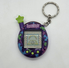 2004 Bandai Tamagotchi Connection v4.5 Puzzle Pieces Purple Virtual Pet WORKS