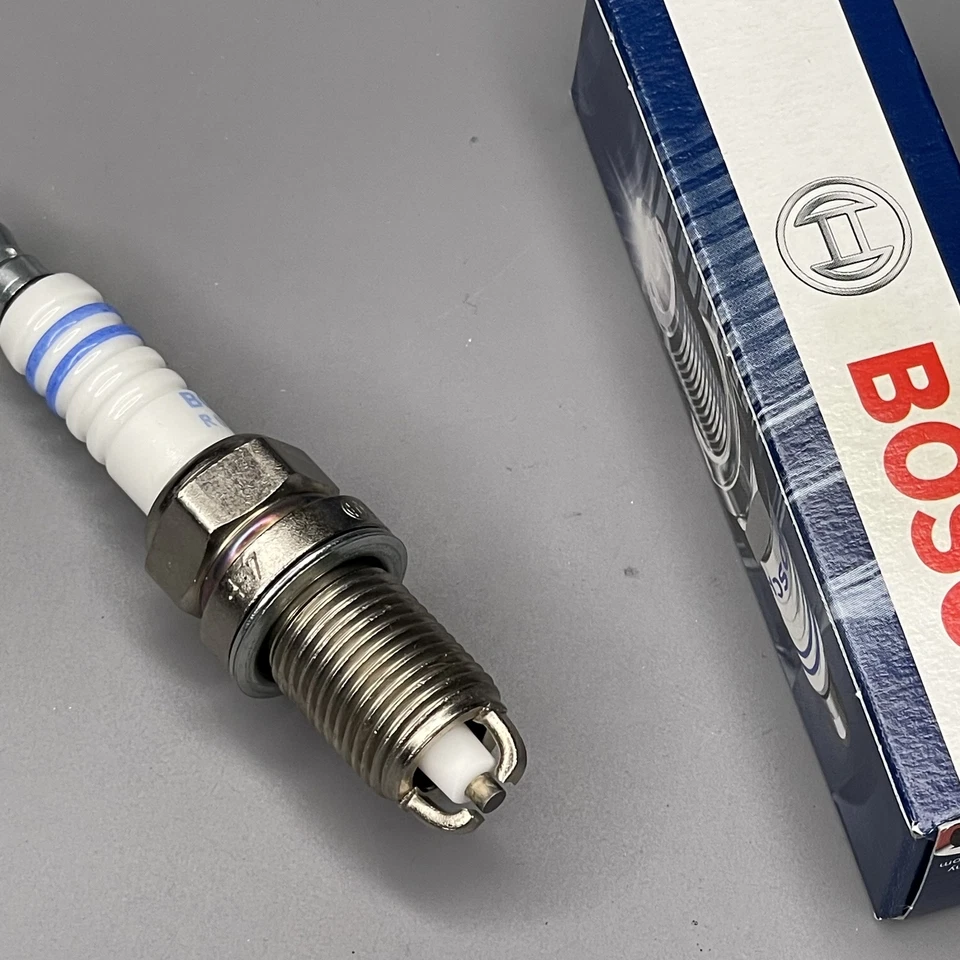 Bujía de itrio original 7402 para BMW E31 840Ci E32 740i E34 530i 540 E38 E39 8 piezas Foto 3 de 4