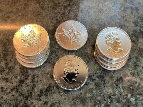 10 ounces silver. 1 oz rounds. 2013 Elizabeth II, Canadian Maple Leaf .9999 fine