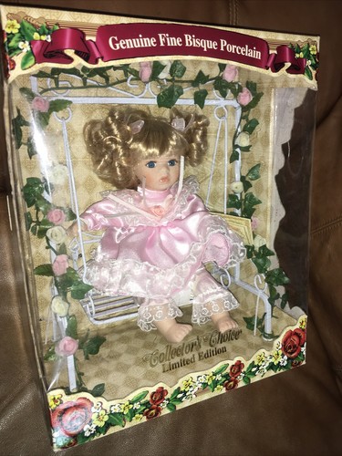 COLLECTORS CHOICE-GENUINE FINE BISQUE PORCELAIN DOLL ON SWING BY DanDee LIMITED