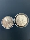 silver coins (1 oz each) ( Maple Leaf and American Eagle)