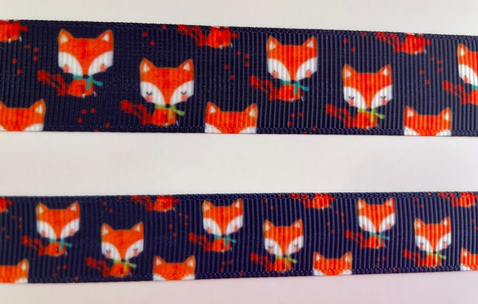 Orange fox print on navy blue Grosgrain ribbon 5/8
