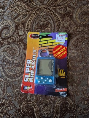 Light blue Super Breakout Pocket/Keychain Game (1998 - MGA) 1.75'' x 2.5'' x .5''