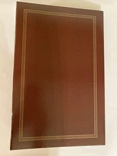 Set of 2 Photo Albums 1-Unbranded Holds 420 1-Thompson USA Holds 294 Pictures