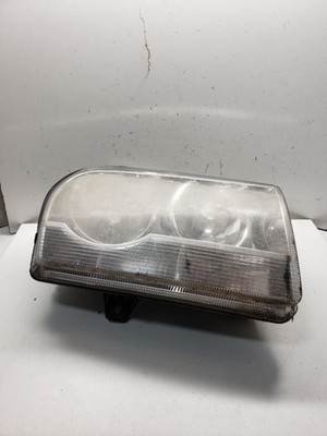 Used Right Headlight Assembly fits: 2007 Chrysler 300 halogen w/o projector Righ
