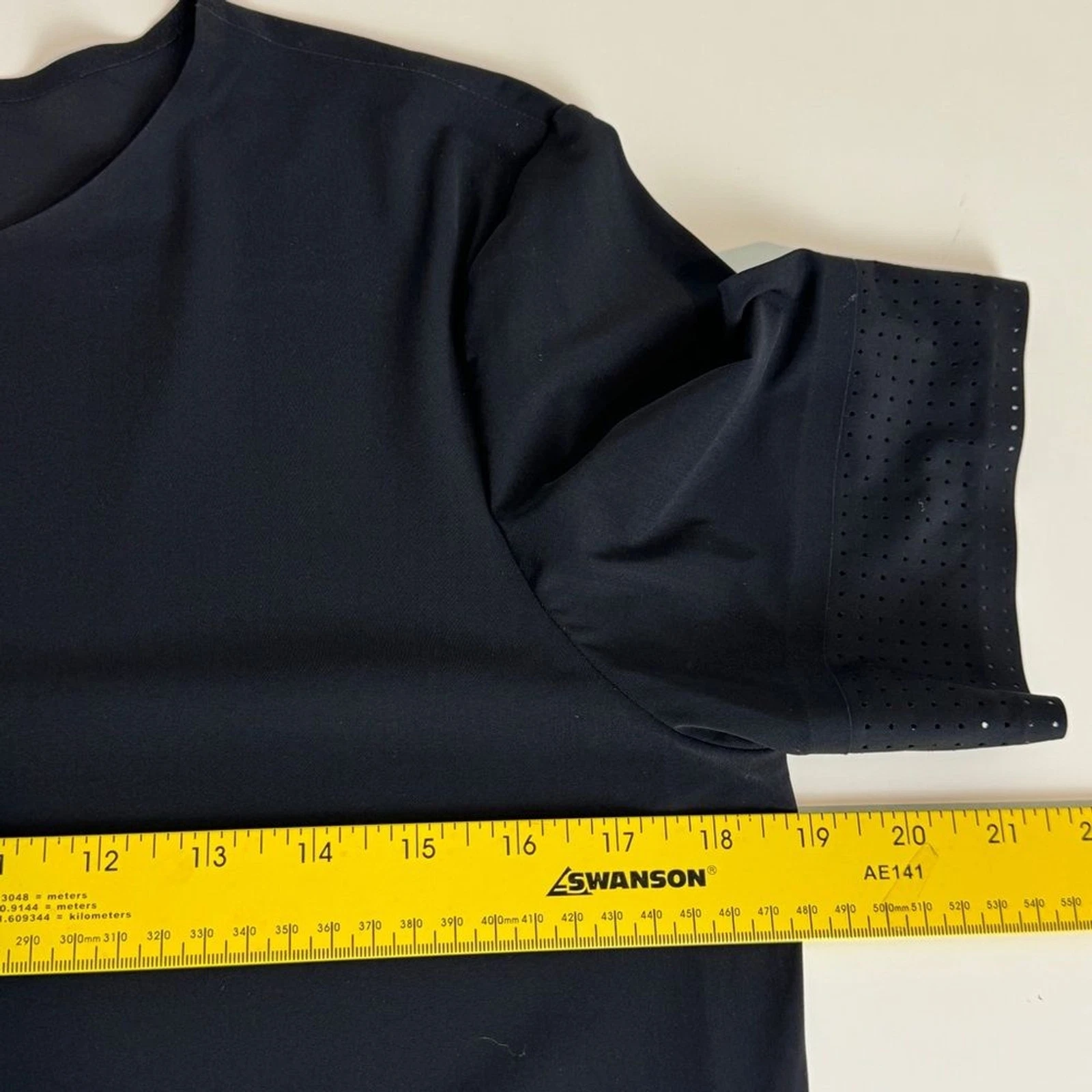 sweaty-betty perforated edge performance athletic shirt